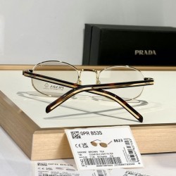 Prada Sunglasses with the iconic metal plaque brown